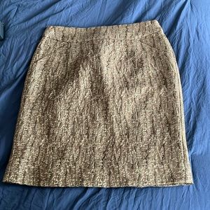 J crew gold metallic miniskirt, size 4. Wool blend. Fully lined. Front pockets